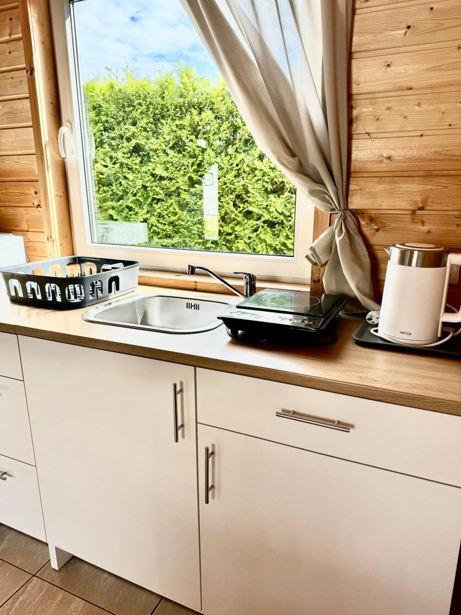 Domki Letniskowe Modrzew Rewal Buitenkant foto